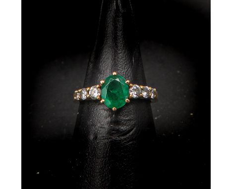 Emerald is approximately 5 x 7 mm., ring size 17.