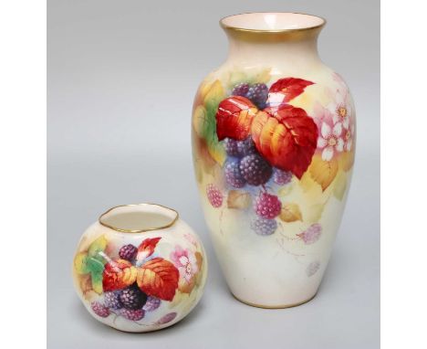 A Royal Worcester Porcelain Vase, 1937, by Kitty Blake, painted with autumnal leaves and berries, printed mark and signed, 17