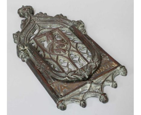 A Gothic Revival Cast Bronze Door Knocker, the pierced back plate surmounted by a crown figure and with inscribed spurious da
