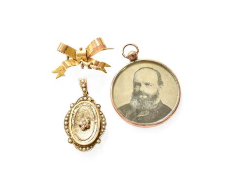 A 9 Carat Gold Split Pearl and Enamel Pendant, measures 3.2cm by 2.1cm (a.f.); A 9 Carat Gold Bow Brooch, measures 2.9cm by 2
