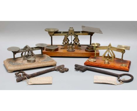 A Set of Brass Postal Scales, with a nest of weights, together with two similar sets, one marked Mordan &amp; Co., two 18th c