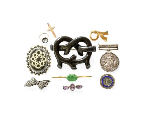 A Quantity of Jewellery, including a 9 carat gold cross pendant; a ribbon motif brooch, stamped ‘750’; a jet brooch; an ename