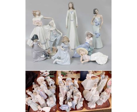 A Large Quantity of Assorted Nao Porcelain Figures, together with similar (three trays)
