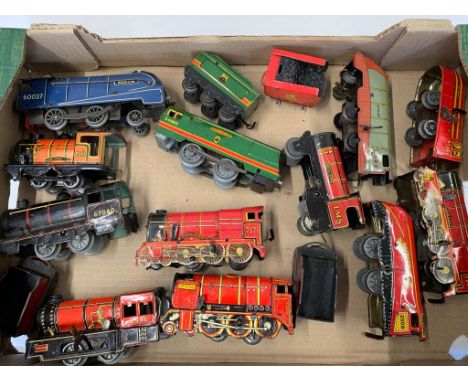 Mixed 0 Gauge ainly by Chad Valley, 11 various models of clockwork engines, 0-4-0     condition 3-5, playworn    1097