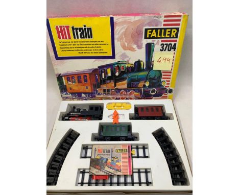 FALLER 0 Gauge Hit Train with battery operated 0-6-0 engine & 2 4 X wheel passenger carriages and track    Condition 2    499