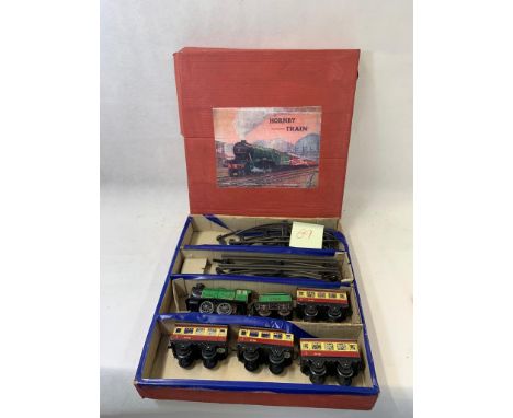Hornby 0 gauge clockwork set with 0-4-0 engine & Tender no. 2595 with 4 tin plate passenger carriages no 9798 in cream & red 