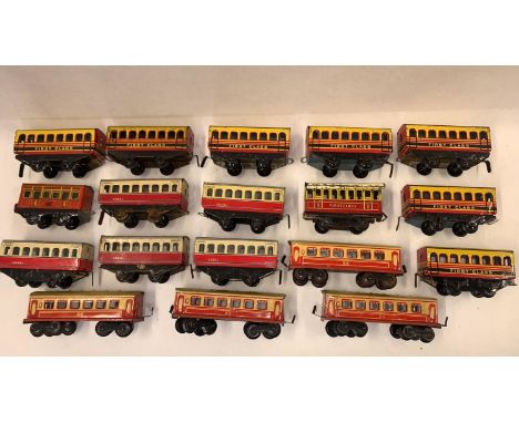 BRIMTOY & other makers, 18 x tinplate passenger carriages, 14 are wheel, 4 are twin bogey, playworn  Condition 5  889