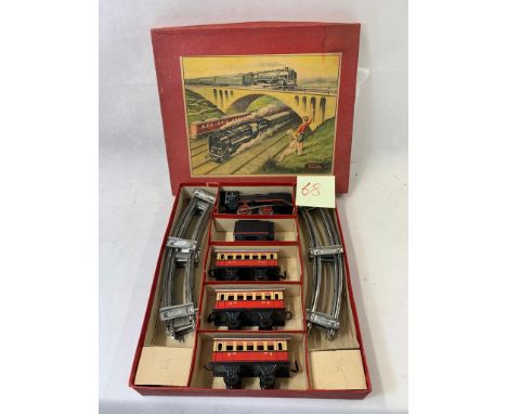 Keim (W. Germ U.S.Zone) 0 gauge clockwork set with 0-4-0 engine & tender with 3 x 4 wheel carriages. All tin plate plus track
