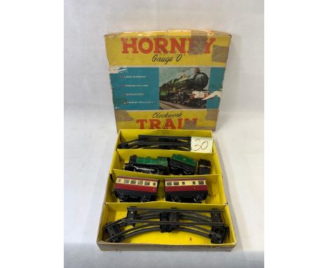 Hornby O gauge no.31 clockwork passenger train set with 0-4-0 engine & Tender no. 45746 in BR green & 2 carriages in red & cr