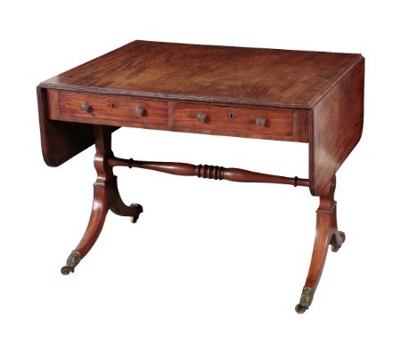 A REGENCY MAHOGANY SOFA TABLE early 19th century, the rectangular top with rounded corners and reeded edge, two frieze drawer