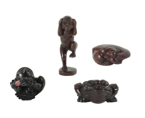 A GROUP OF FOUR JAPANESE NETSUKE all signed, the tallest, a monkey on one leg, 7cm high, the toad 2.5cm high (4)Provenance: a