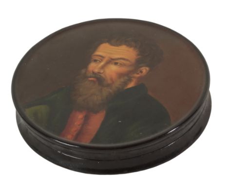 AN EARLY 19TH CENTURY PAPIER MACHE BOX the lid painted with a portrait of Gutenberg, 9cm diameter x 1.5cm high, the box conta