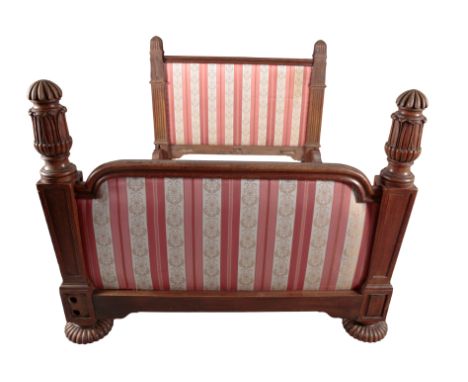 â€˜KING EDWARD VIIâ€™S BEDâ€™: A MONUMENTAL VICTORIAN OAK DOUBLE BED the head and foot upholstered in striped cloth, flanked 