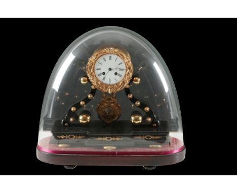 A 19TH CENTURY FRENCH ORMOLU AND EBONISED MANTLE CLOCK the white enamelled dial with Roman numerals, the two train movement s