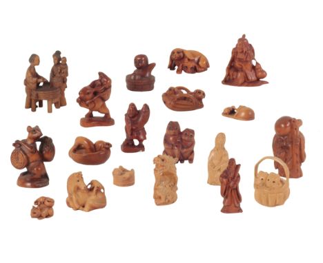 A COLLECTION OF JAPANESE NETSUKE AND OKIMONO the tallest, a figure with a staff, 6.5cm high, the smallest, two rats in a slip