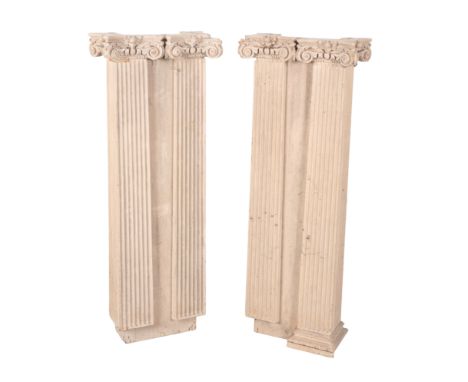 A PAIR OF PAINTED PINE FLUTED ARCHITECTURAL PILASTERS 20th Century, with fluted bodies and carved Corinthian capitals, each 1