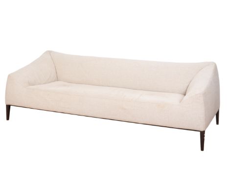 A CONTEMPORARY POLIFORM THREE SEATER SOFA upholstered in fawn chenille, on black metal legs, 80cm high x 226cm wide x 90cm de