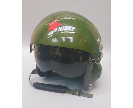 A Chinese Mig pilot's flight helmet (reproduction) with padded interior and drop down sun visor bering a single red star insi