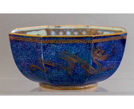 A 1920's Wedgwood Art Deco octagonal lustre bowl designed by Daisy Makeig-Jones, the exterior decorated with dragons chasing 