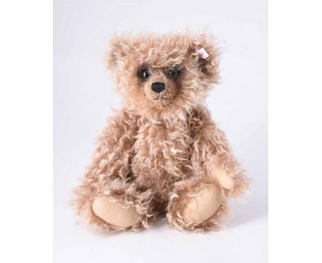 
	
		STEIFF, GRIZZLY TEDDY, 01673, CIRCA 2004
		Limited edition of 2,000, with long wavy pale brown mohair, darkened around t