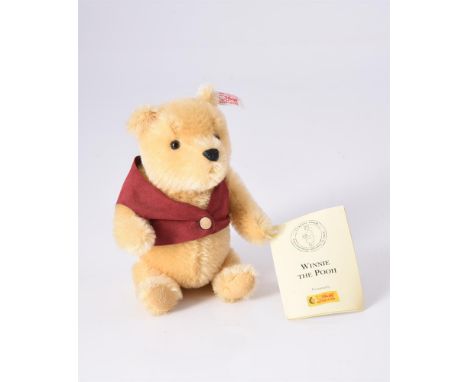 
	
		STEIFF, WINNIE THE POOH, 04151, 75th ANNIVERSARY LIMITED EDITION, CIRCA 2001
		Blond mohair, red waistcoat, button in ea