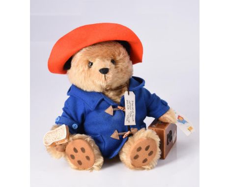 
	
		STEIFF, PADDINGTON BEAR, 03561
		Limited Edition, beige mohair, blue duffel coat, red woollen felt hat, label reading 'P