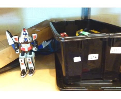 Box of Transformer toys, indoor bowls set, kite, hockey stick