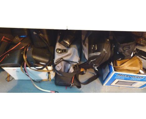 Box of assorted empty binocular cases and a box of empty camera cases etc