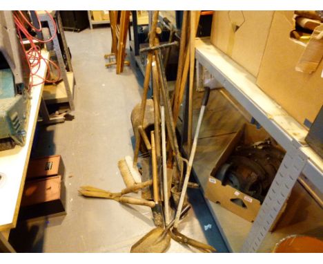 Selection of gardening tools including a lawn roller