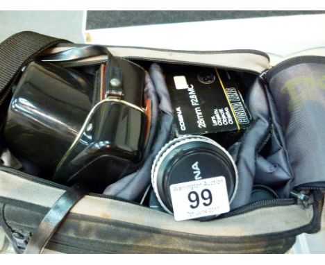 Cased Praktica MTL5 film camera with associated lenses and equipment 