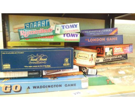 Shelf of assorted games, including Trivial Pursuit, Totopoly etc