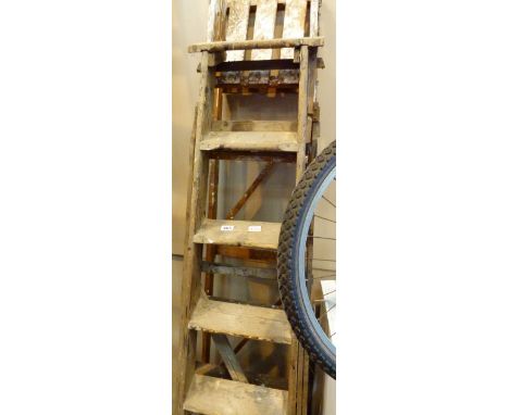 Two pairs of wooden step ladders