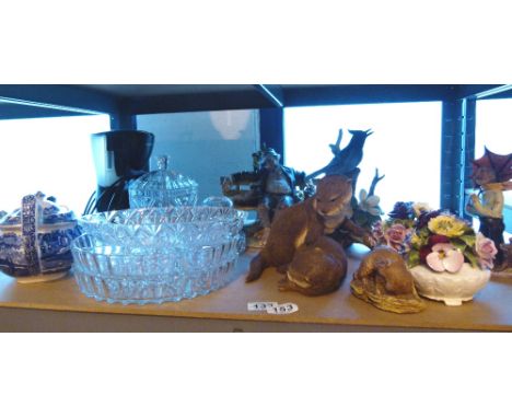 Shelf of glassware and pottery, including blue/white teapot and stonecraft animals