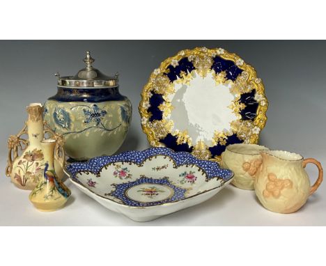 A Locke &amp; Co. Worcester milk jug and sugar bowl, moulded in relief with fruit; a Locke and Co. Worcester miniature vase, 