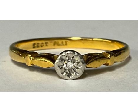 A 22ct gold diamond solitaire ring, the stone illusion set in platinum bezel, size P, 2.9g, boxed 