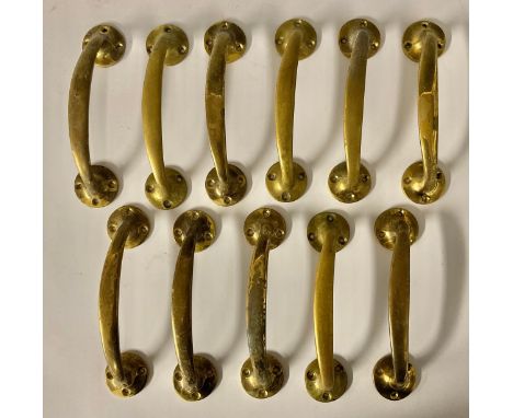 Architectural Salvage - eleven curved brass door handles 