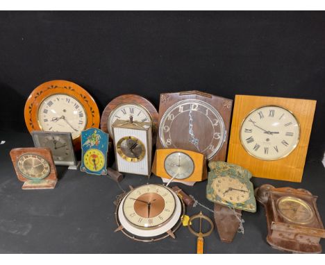 Clocks - an early 20th century school or railway clock, 28cm diameter; a Russian Lantaz rectangular wall clock; another circu