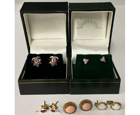 A pair of 9ct gold ruby and diamond chip earrings, marked 9ct, 0.7g, boxed; a pair of 9ct gold multi-gemstone earrings, marke