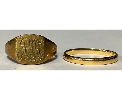 A 9ct gold signet ring, size R, 2.3g; a 9ct gold wedding band, ring size O, marked 375, 1.5g (2) 