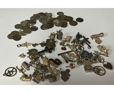 A sterling silver charm, windmill, St Paul's Cathedral, Port and Starboard lanterns, bagpipes, astrology,  filigree owl, hear