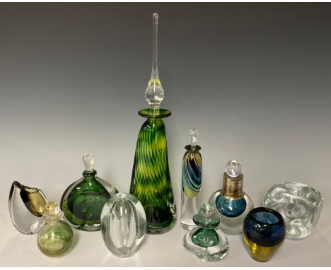 An art glass slender elongated bottle vase and stopper, in swirls of green and yellow, 39.5cm; other smaller cases glass scen