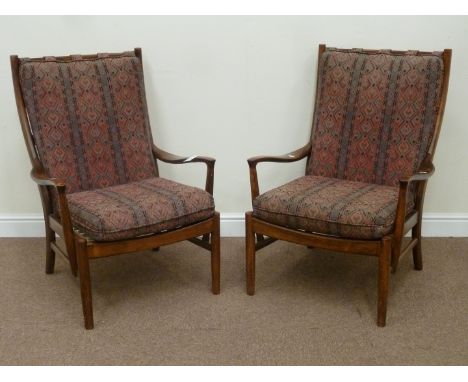 Pair Parker Knoll vintage retro easy chairs fitted with aztec pattern loose cushions, W66cm