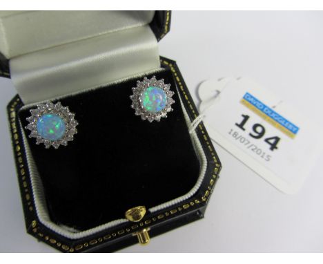 Pair of opal dress ear-rings