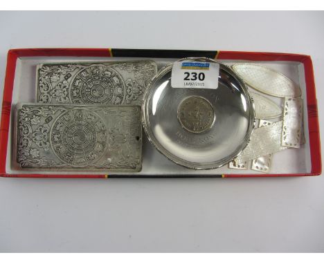 Chinese sterling silver coin pin dish, two Chinese white metal paperweights, and five Chinese mother of pearl gaming counters