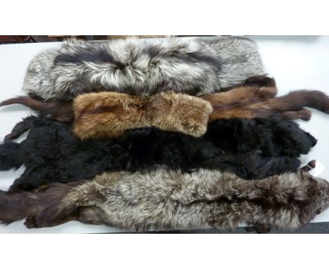 Vintage clothing - black fox fur stole and three others in one box

Provenance: Charlotte Louise Adela Evelina Rothschild (18