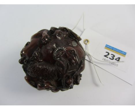 Amber netsuke intricately carved with animals including dragon, monkey, goat, buffalo, rabbit, horse, sow, hen with signature