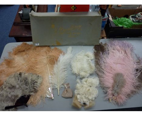 Vintage clothing - ostrich feather fan with mother of pearl spines, one other and a collection of loose ostrich feathers in a