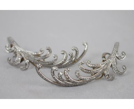 Pair of Chopard earrings, each with 200 at a 4 carat rating  diamonds, 18ct gold. Serial Number  84/5312/0. Part of a collect