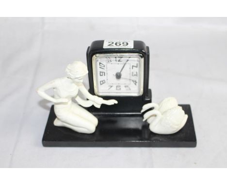 Art deco style battery operated clock -  lady with swans decoration, ht 12 cm 
