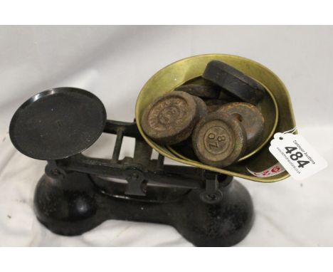 Antique weighing scales with brass weights 